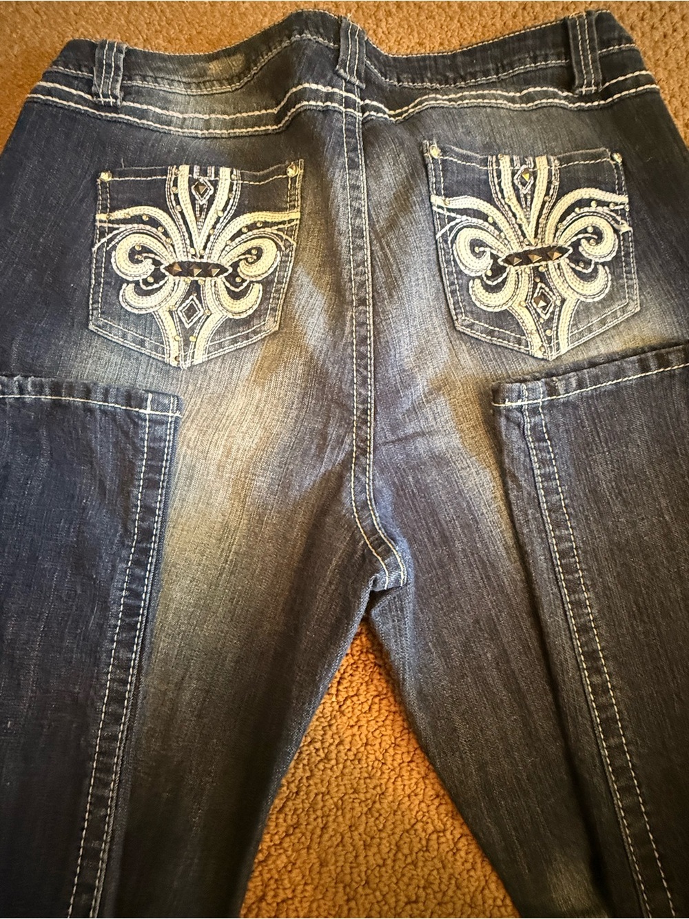 Embellished Dark Wash Denim Jeans with Fleur-de-Lis Back Pockets